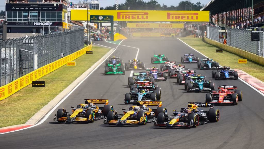 oscar-piastri-of-mclaren-lando-norris-of-mclaren-and-max-news-photo-1721659256.jpg