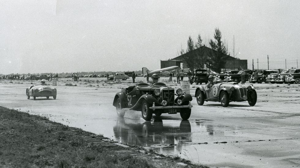 cars-race-on-the-wet-concrete-runways-during-the-12-hours-news-photo-1741962313.jpeg